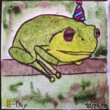 a small square watercolour painting of a tree frog sitting on a branch. it looks a bit derpy, and wears a conic party hat. the hat has blue and red stripes and a small red sphere on top. the colours of the frog are greens and yellow for the body, and red in it's eyes. the branch is brown, and the background a mix of darker greens and brown. it is named 'b-day' and dated 10/24/24.